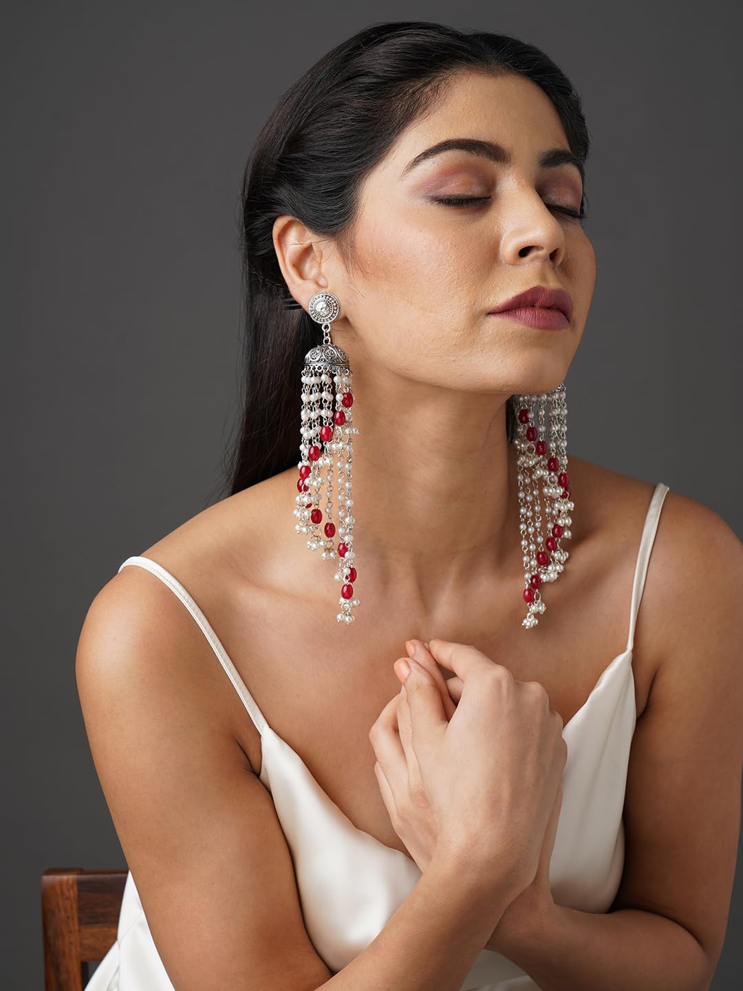 Binnis wardrobe Dual-Toned textured long Jhumka with hanging pearl handcrafted earrings