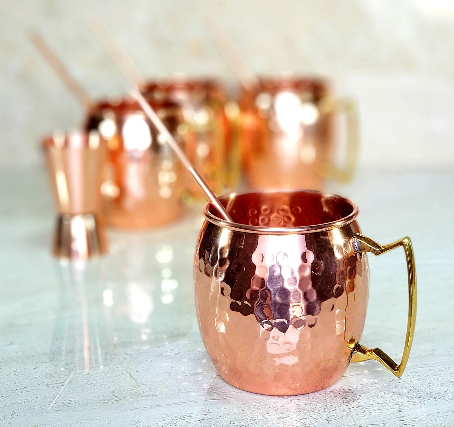 eSplanade Moscow Mule Cocktail Copper Mugs - Set of 4 Mugs, 4 Copper Straws, and a Peg Measurer (HAMMERED BRASS HANDLE)