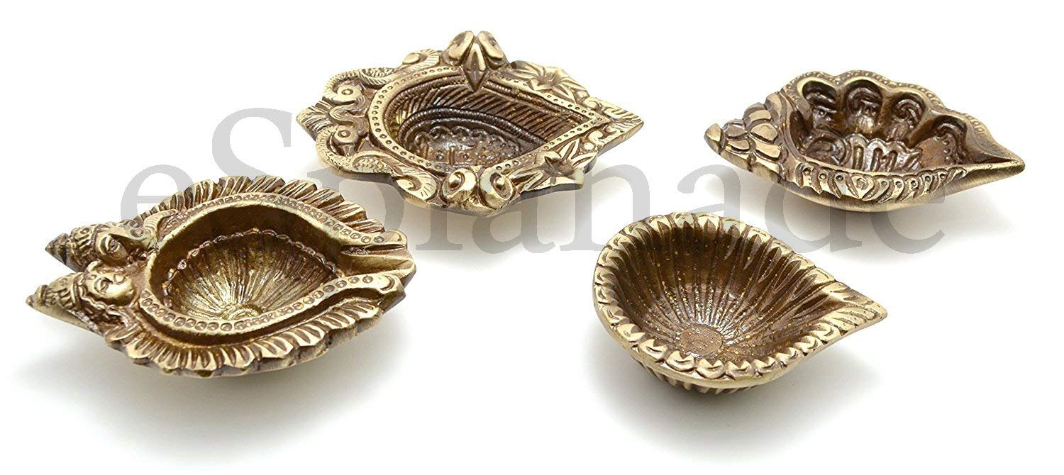 eSplanade - Brass Pooja Articles Deepak, Deepam - Auspicious Set of 4 Diyas - Ganesha and Laxmi Embossed, Conch Shaped Lamp, Swastik Design Oil Lamps - Home Décor - 3.5" Inches