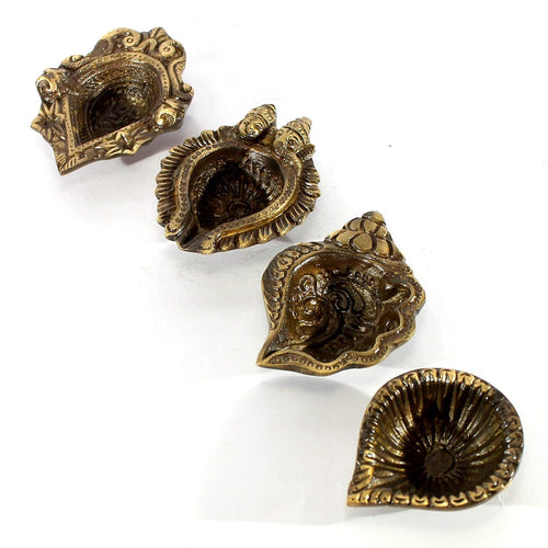 eSplanade - Brass Pooja Articles Deepak, Deepam - Auspicious Set of 4 Diyas - Ganesha and Laxmi Embossed, Conch Shaped Lamp, Swastik Design Oil Lamps - Home Décor - 3.5